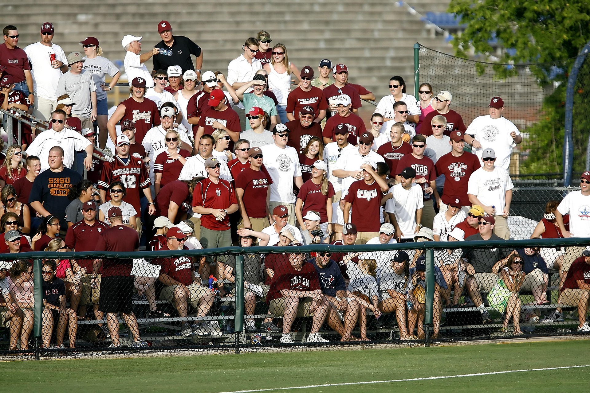 Student commentators seated away from loud speaker stacks